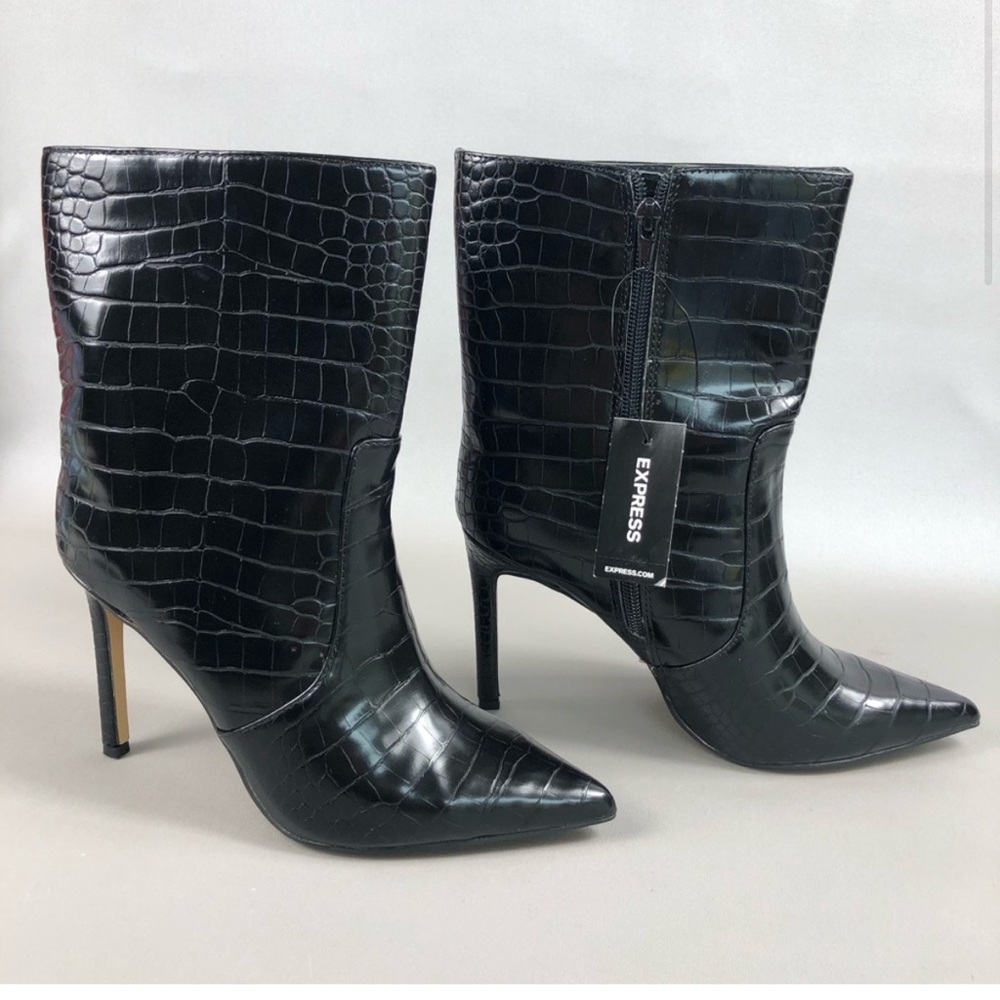 Worn once: Express Women’s Faux Leather Animal Print Thin Heeled Boots Size 9